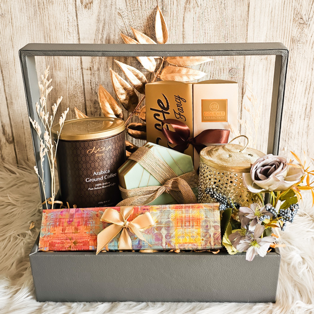 Serene Hamper gift basket featuring Bateel assorted dates, truffle chocolates, a candle holder, and elegant decor items